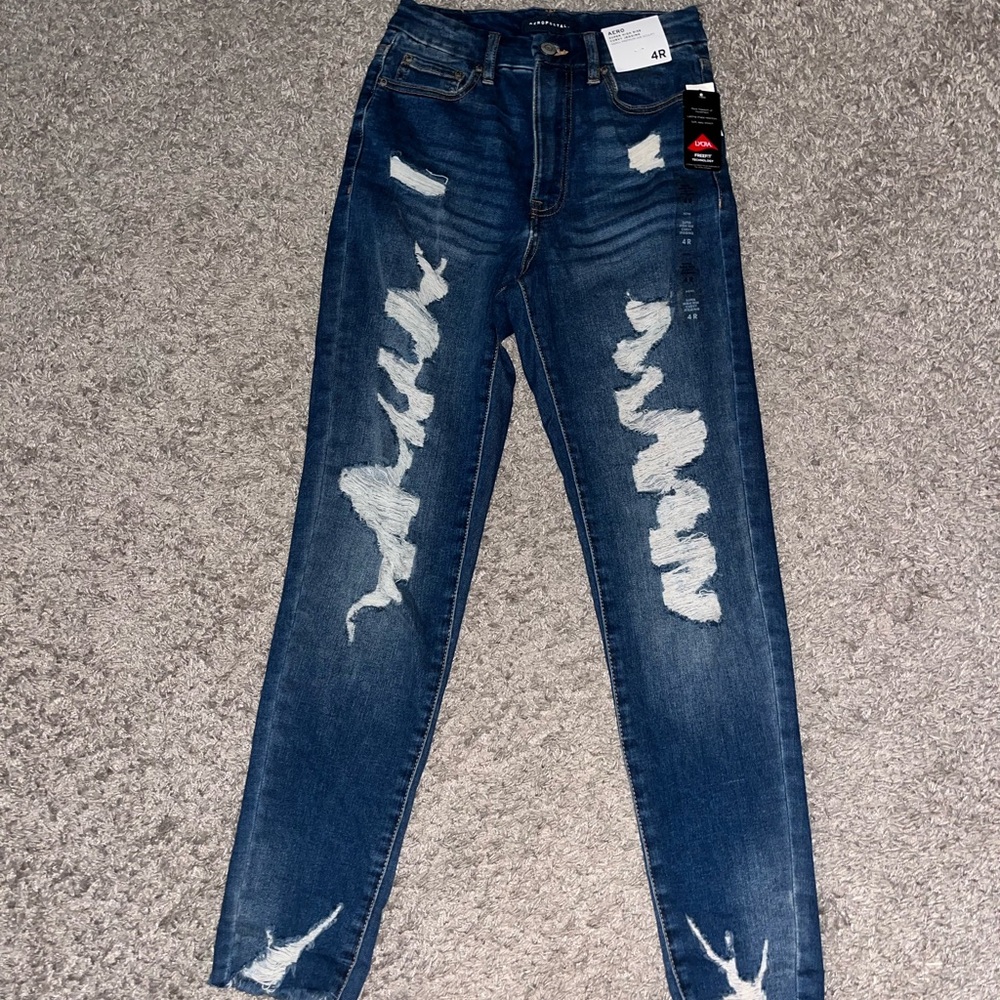 Super High Rise Distressed Blue Skinny Jeans